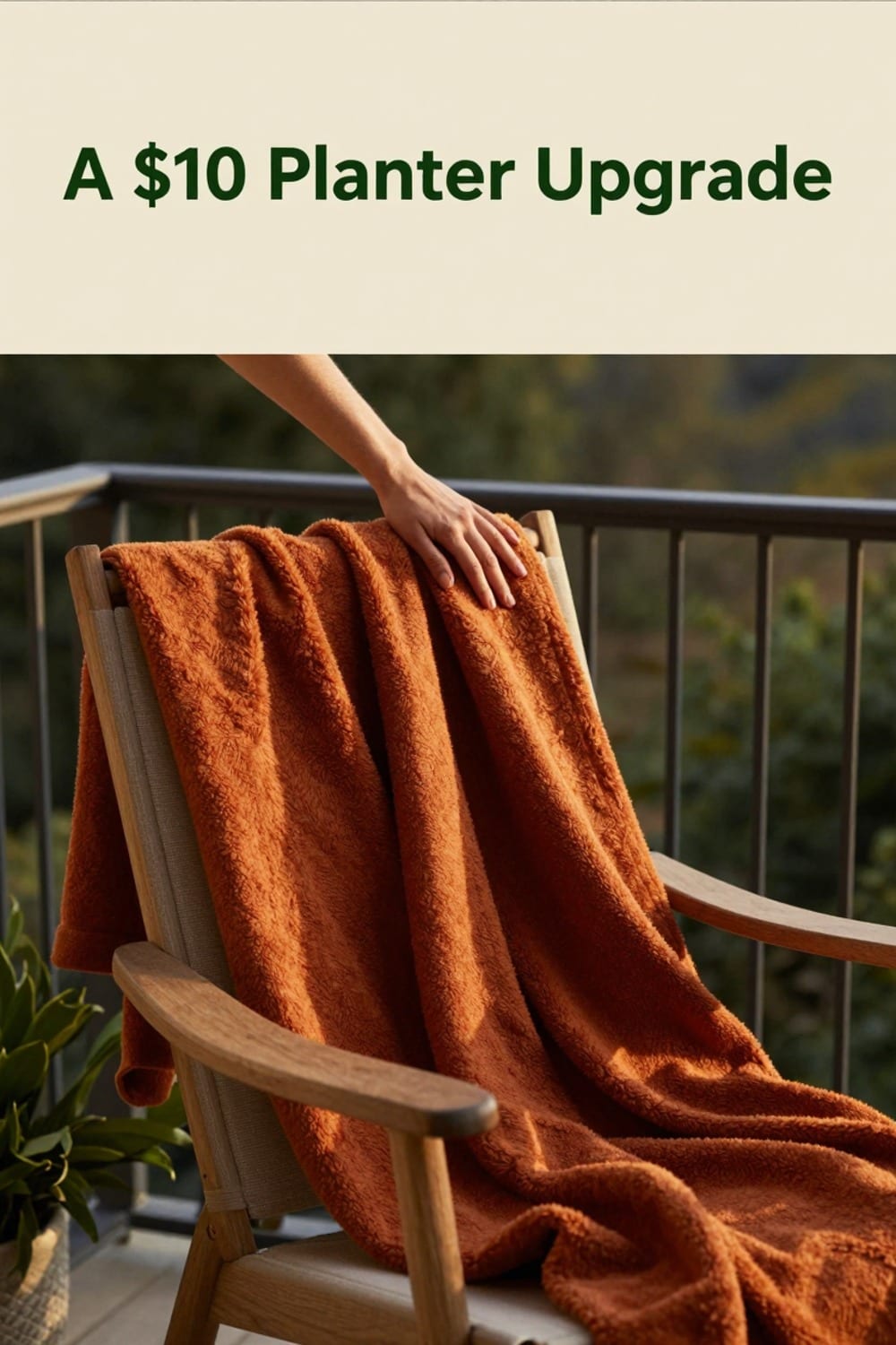 Rust-orange outdoor throw blanket draped over the back of a single balcony chair